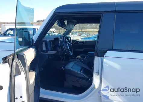 2023 Ford Bronco Wildtrak z USA, uszkodzony, nr VIN 1FMEE5DP4PLB30699